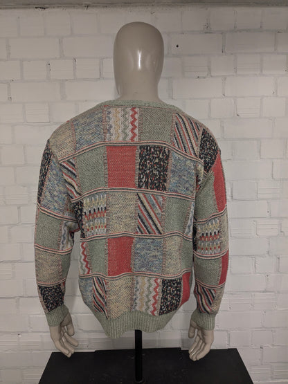 Maglione vintage Monte Carlo con scollo a V. Motivo colorato. Taglia L.