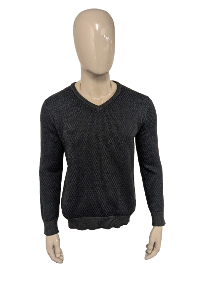 Pull Zilton Wool avec col en V. Motif bleu gris foncé. Taille L. 100% Laine.