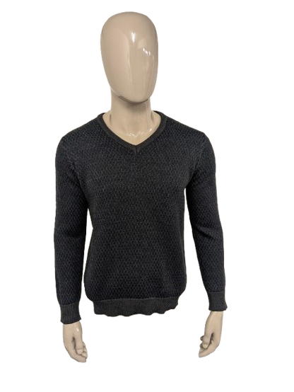 Maglia Zilton in lana con scollo a V. Motivo blu grigio scuro. Taglia L. 100% Lana.