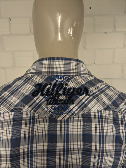 Hilfiger Denim shirt with press studs. Blue and white checked. Size S.
