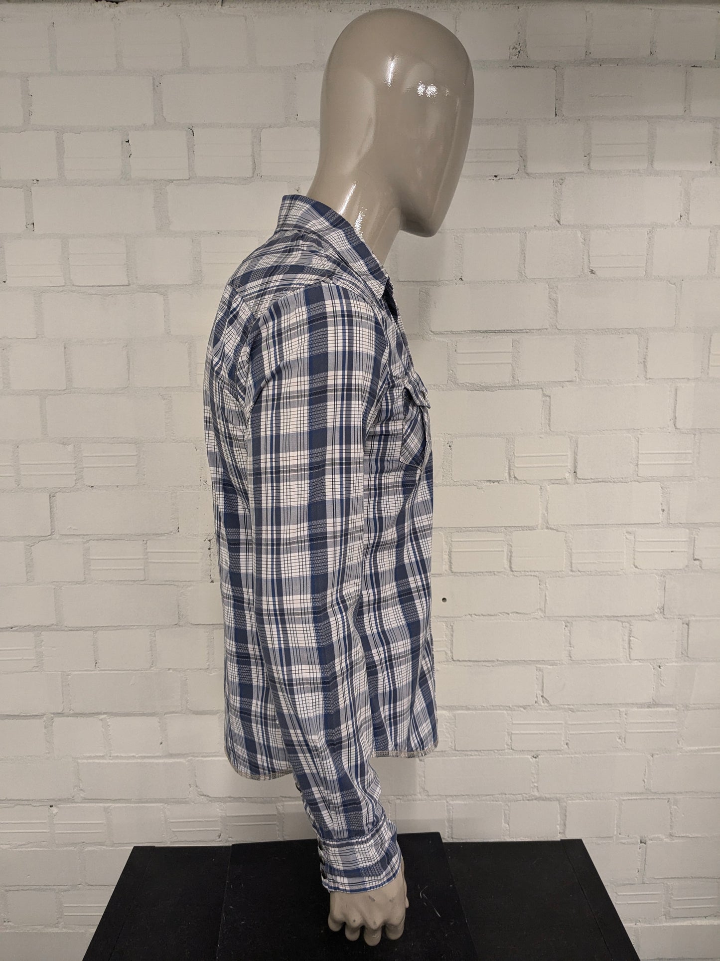 Hilfiger Denim shirt with press studs. Blue and white checked. Size S.