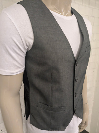 Chaleco Butler & Web. Motivo mixto gris. Talla M. Corte entallado.