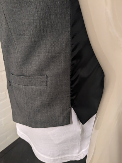 Chaleco Butler & Web. Motivo mixto gris. Talla M. Corte entallado.