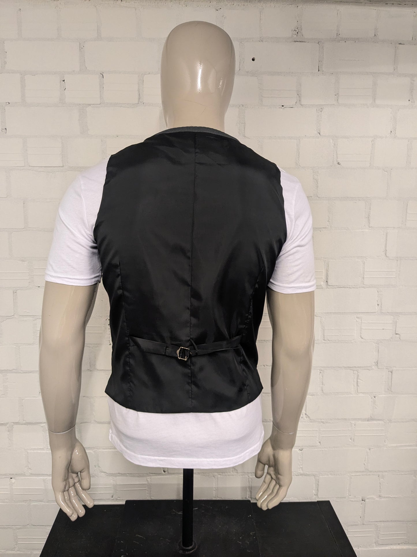 Chaleco Butler & Web. Motivo mixto gris. Talla M. Corte entallado.