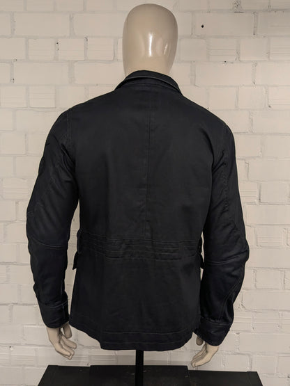 G-Star RAW between coat / jacket. Dark Blue colored. Size M.
