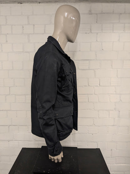 G-Star RAW between coat / jacket. Dark Blue colored. Size M.