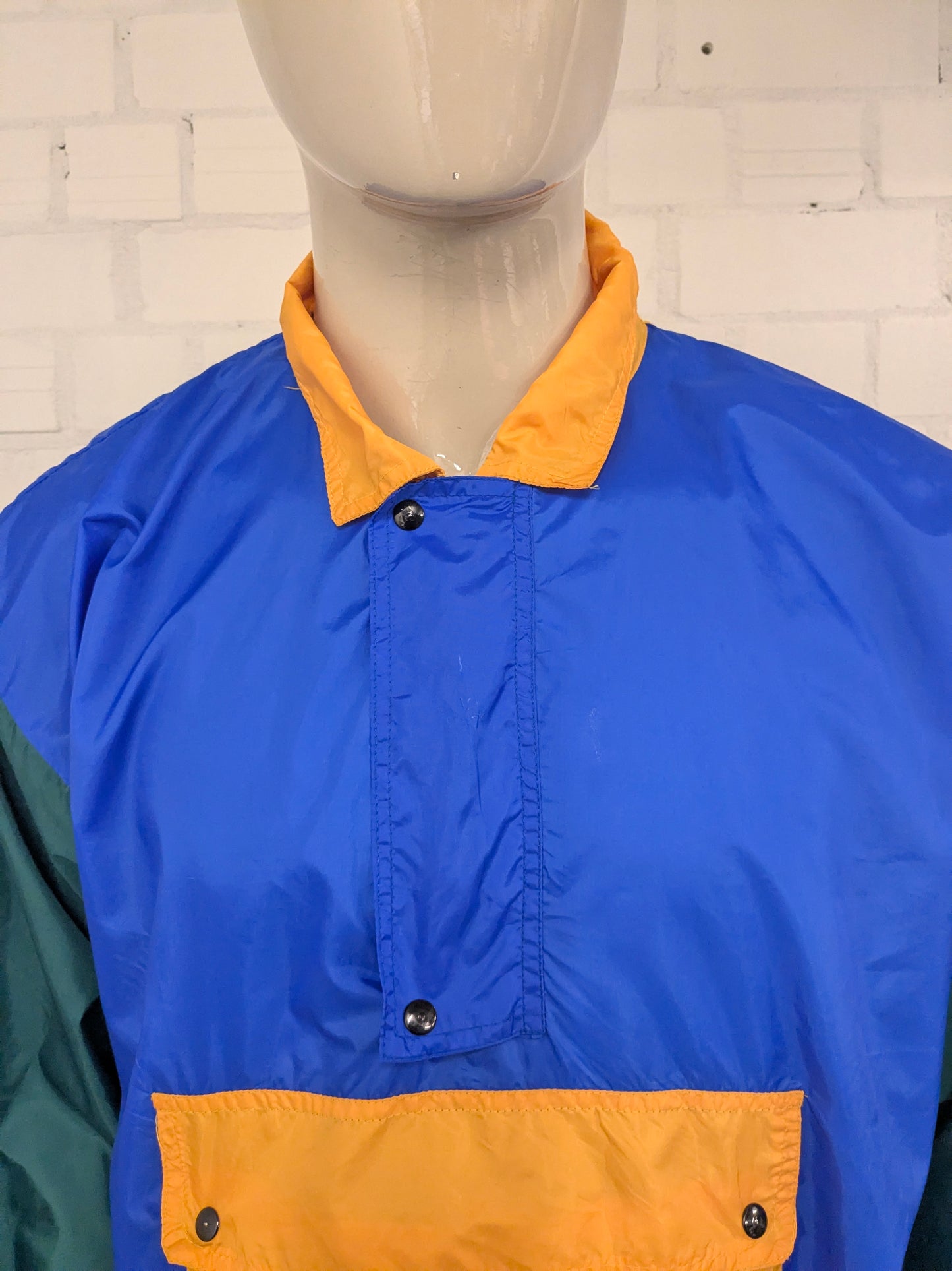 Fantastisch Vintage Olympique Albertville '92 windjack. Blauw Geel Groen gekleurd. Maat L / XL.