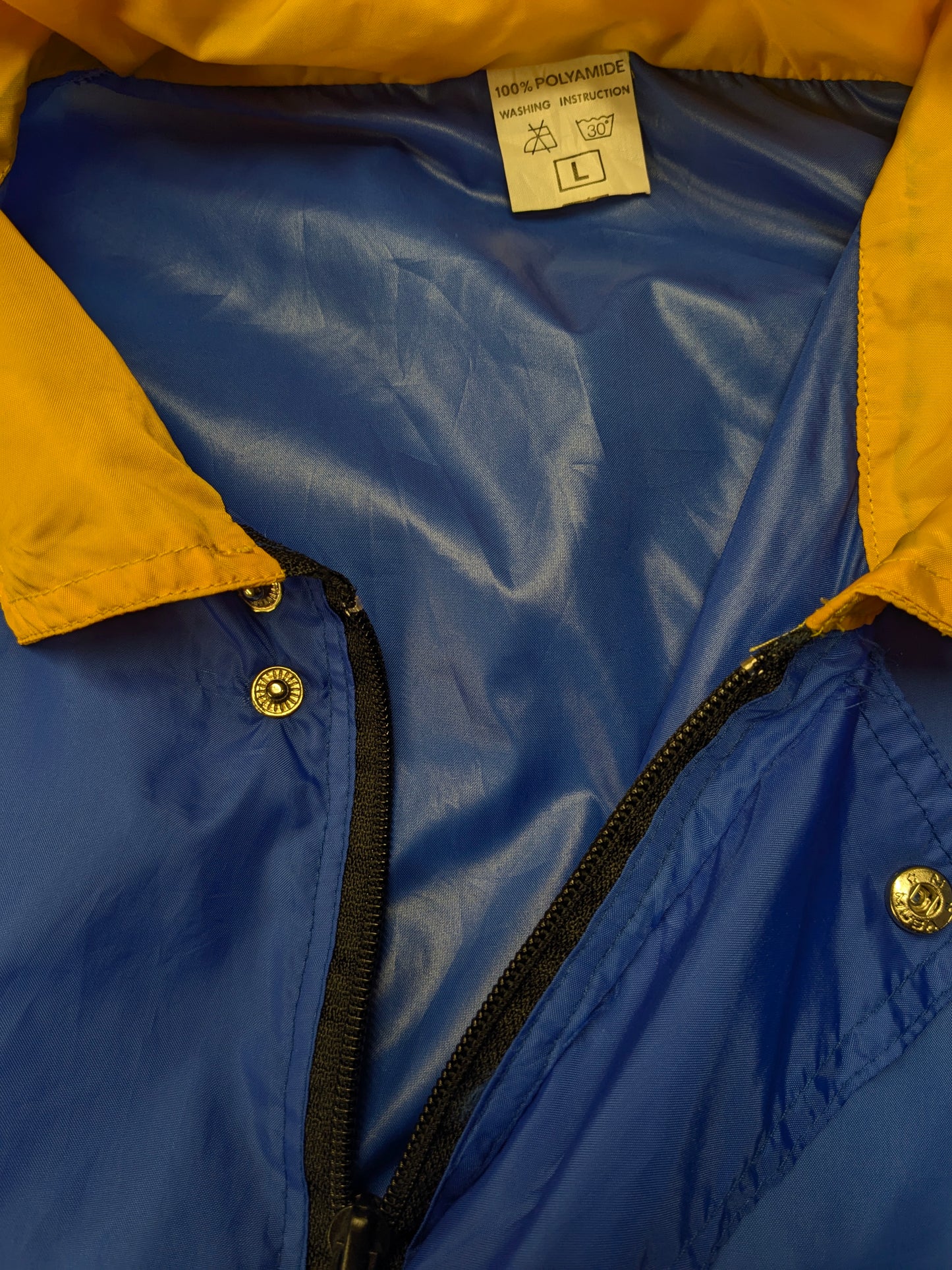 Fantastisch Vintage Olympique Albertville '92 windjack. Blauw Geel Groen gekleurd. Maat L / XL.