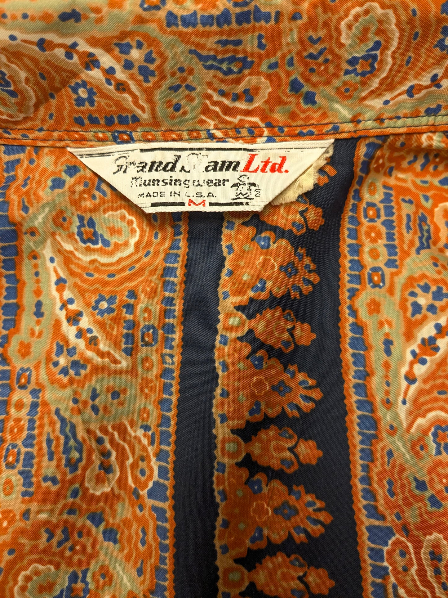Vintage Grandslam ltd shirt with pointed collar. Orange Green Blue print. Size M.