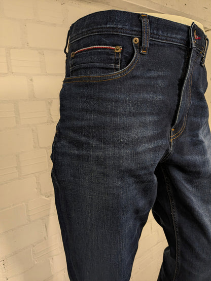 Tommy Hilfiger jeans. TH Flex. Dark Blue colored. Size W36 - L36. Houston stretch.