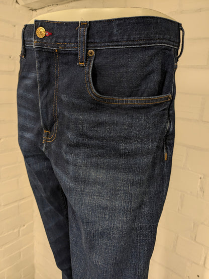 Tommy Hilfiger jeans. TH Flex. Dark Blue colored. Size W36 - L36. Houston stretch.