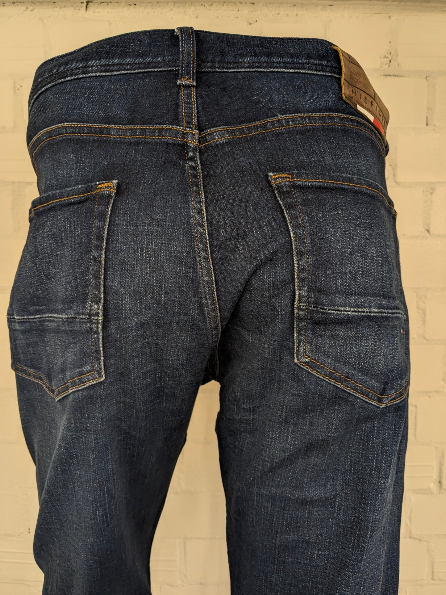 Tommy Hilfiger jeans. TH Flex. Dark Blue colored. Size W36 - L36. Houston stretch.