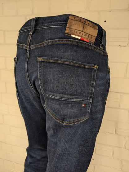 Tommy Hilfiger jeans. TH Flex. Dark Blue colored. Size W36 - L36. Houston stretch.