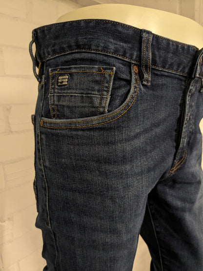 Vaqueros Scotch & Soda. De color azul. Talla W33 - 30. Tipo Ralson. estirar.