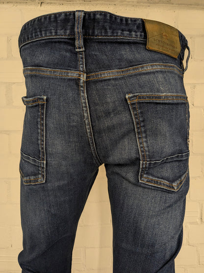 Vaqueros Scotch & Soda. De color azul. Talla W33 - 30. Tipo Ralson. estirar.