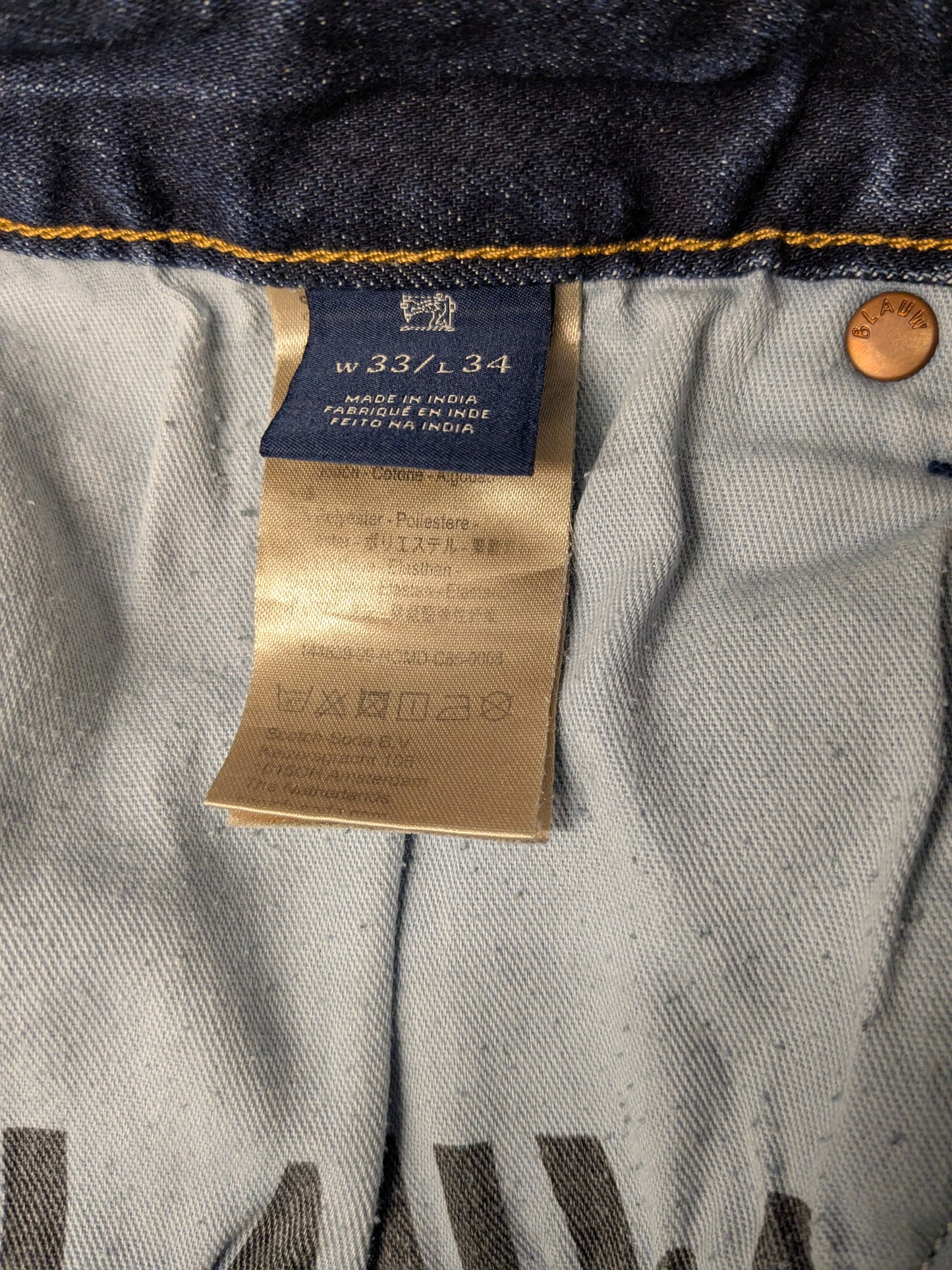 Vaqueros Scotch & Soda. De color azul. Talla W33 - 30. Tipo Ralson. estirar.