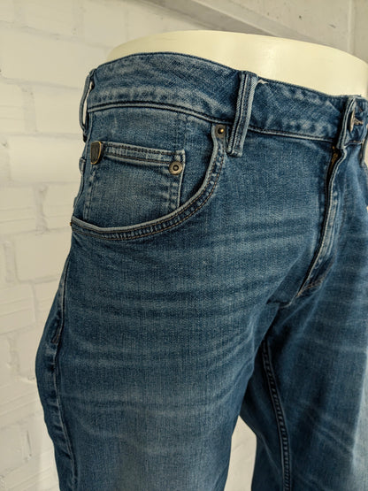 Jean Garcia. Coloré en bleu. type Russo coupe régulière. Taille W38 - L34. extensible.