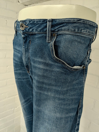 Jean Garcia. Coloré en bleu. type Russo coupe régulière. Taille W38 - L34. extensible.