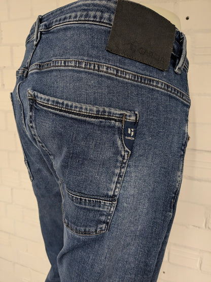 Jean Garcia. Coloré en bleu. type Russo coupe régulière. Taille W38 - L34. extensible.