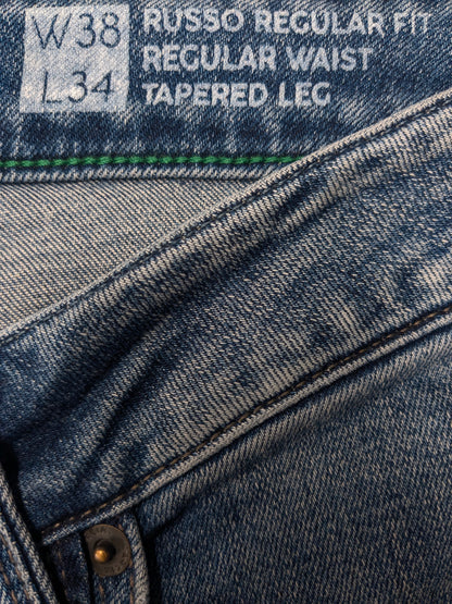 Jean Garcia. Coloré en bleu. type Russo coupe régulière. Taille W38 - L34. extensible.