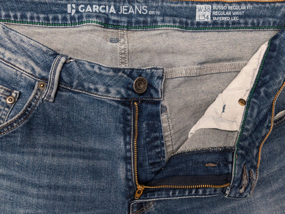 Jean Garcia. Coloré en bleu. type Russo coupe régulière. Taille W38 - L34. extensible.