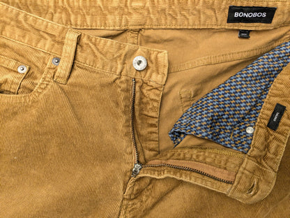 Pantalon côtelé Bonobo. De couleur marron clair. Taille W34 - L32. Tapez sur mesure.