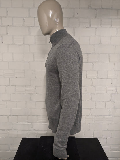 Maglione Tommy Hilfiger 100% lana d'agnello con cerniera. Grigio misto. Taglia XL.