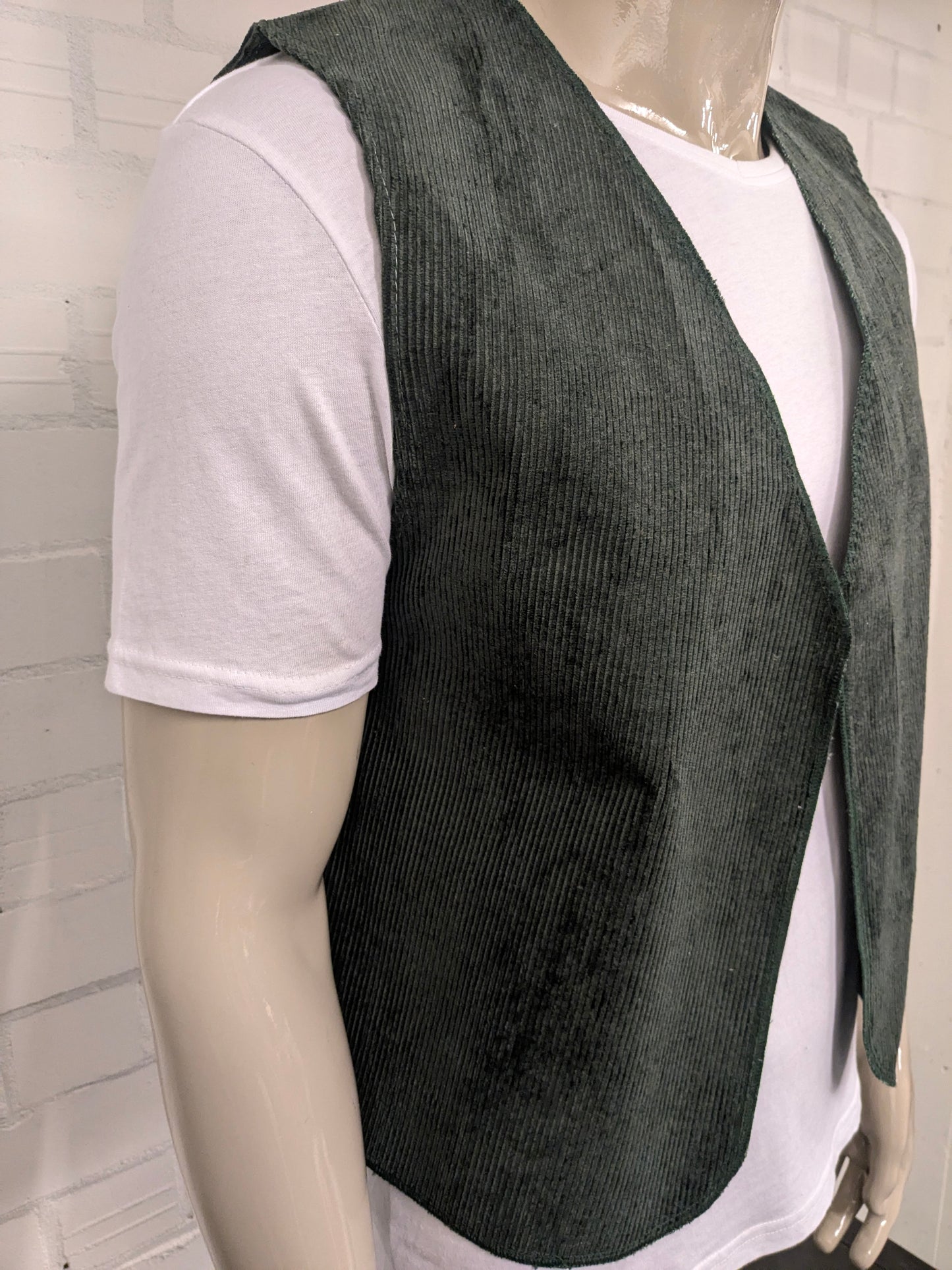 Vintage rib gilet zonder sluiting. Donker Groen gekleurd. Maat M / L.