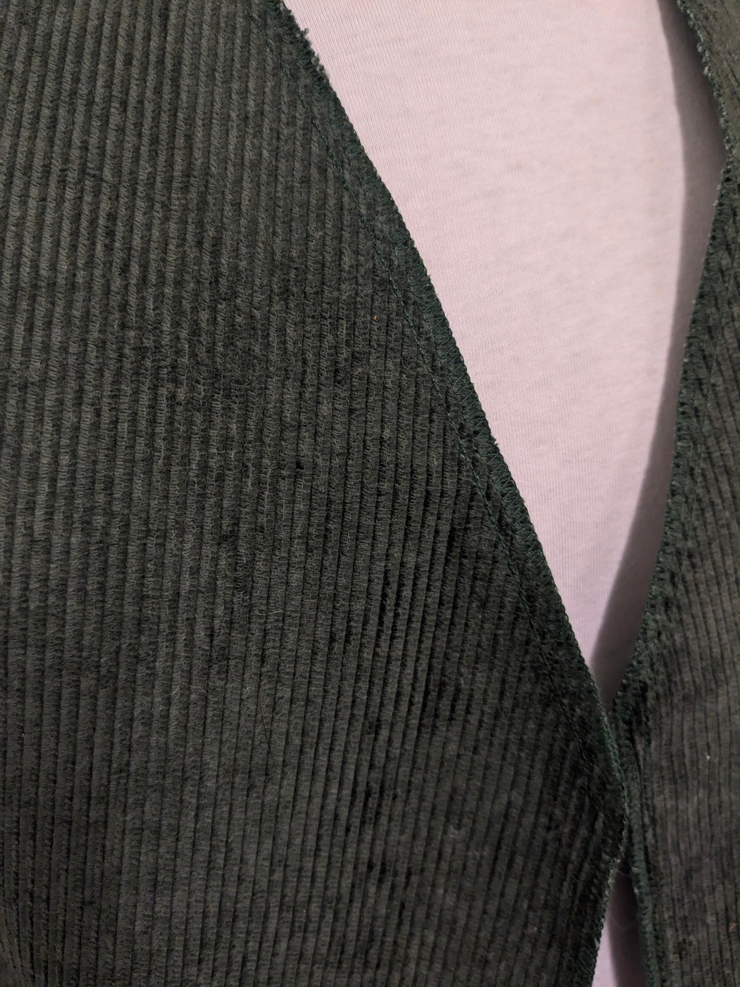 Vintage rib gilet zonder sluiting. Donker Groen gekleurd. Maat M / L.