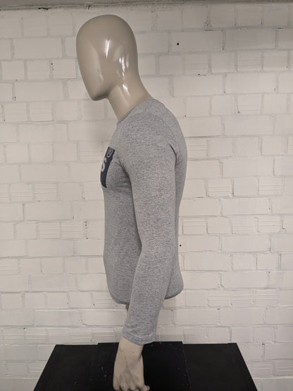 Manica lunga di Levi. Grigio misto a stampa. Taglia S.