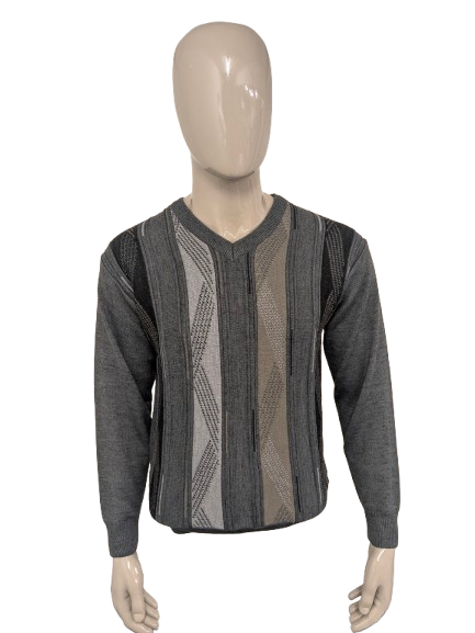 Maglione vintage in lana Trade Wind con scollo a V. Colore grigio kaki. Taglia M. 30% Lana.