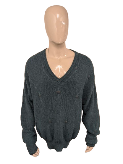 pull vintage Tablelands 100% Merino Wool avec col en V. Coloré en vert. Taille 3XL/XXXL.