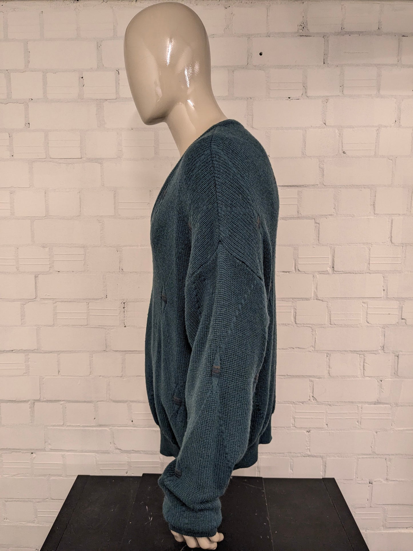 pull vintage Tablelands 100% Merino Wool avec col en V. Coloré en vert. Taille 3XL/XXXL.