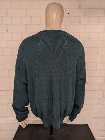 pull vintage Tablelands 100% Merino Wool avec col en V. Coloré en vert. Taille 3XL/XXXL.