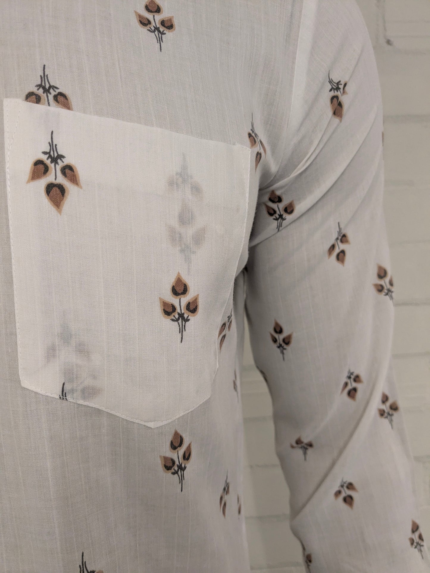 Vintage 70's Ataka overhemd met puntkraag en grotere knopen. Beige Bruine bloemen print. Maat L.