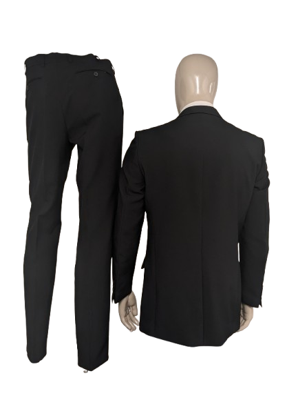 Travelmaster kostuum. Zwart gekleurd. Maat 94 (48 / M).