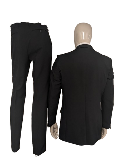 Travelmaster kostuum. Zwart gekleurd. Maat 94 (48 / M).