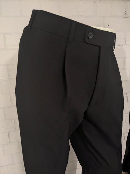 Travelmaster kostuum. Zwart gekleurd. Maat 94 (48 / M).