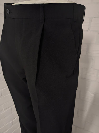 Travelmaster kostuum. Zwart gekleurd. Maat 94 (48 / M).