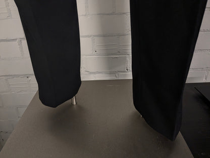 Travelmaster kostuum. Zwart gekleurd. Maat 94 (48 / M).