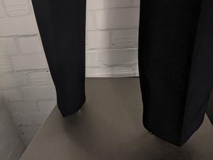 Travelmaster kostuum. Zwart gekleurd. Maat 94 (48 / M).