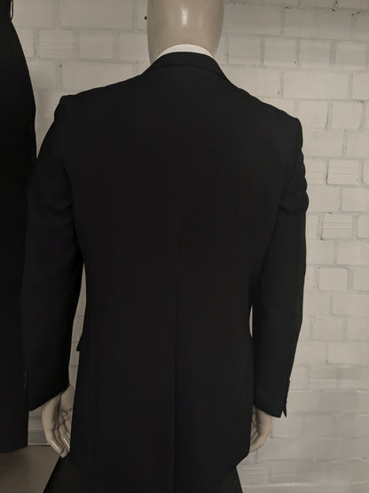 Travelmaster kostuum. Zwart gekleurd. Maat 94 (48 / M).