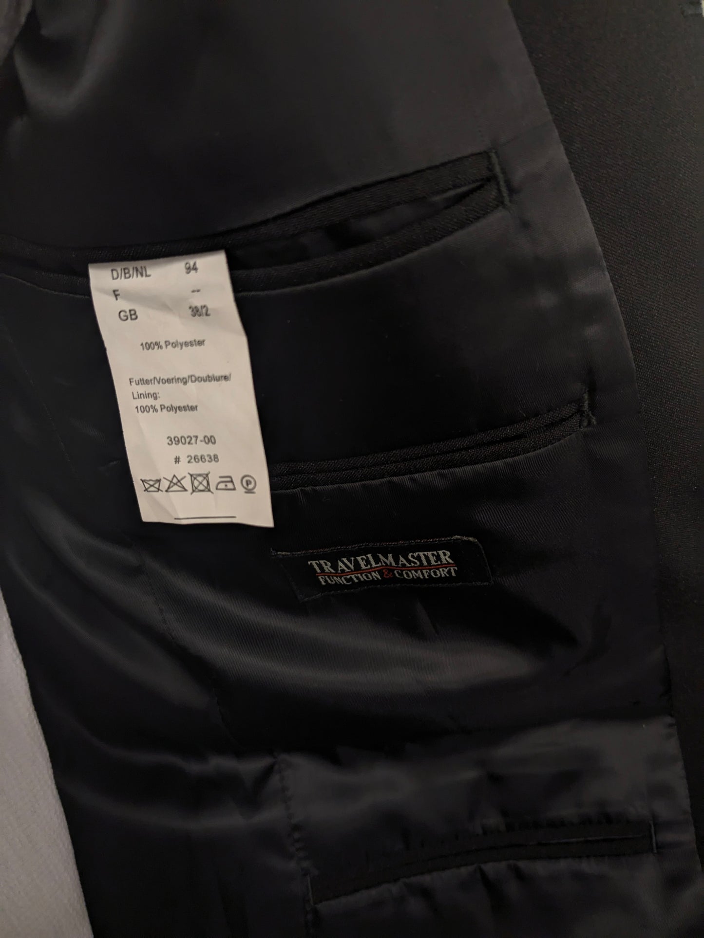 Travelmaster kostuum. Zwart gekleurd. Maat 94 (48 / M).