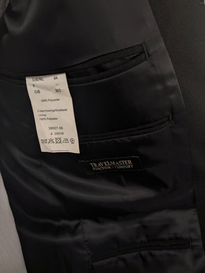 Travelmaster kostuum. Zwart gekleurd. Maat 94 (48 / M).