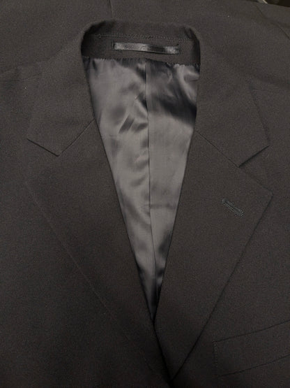 Travelmaster kostuum. Zwart gekleurd. Maat 94 (48 / M).