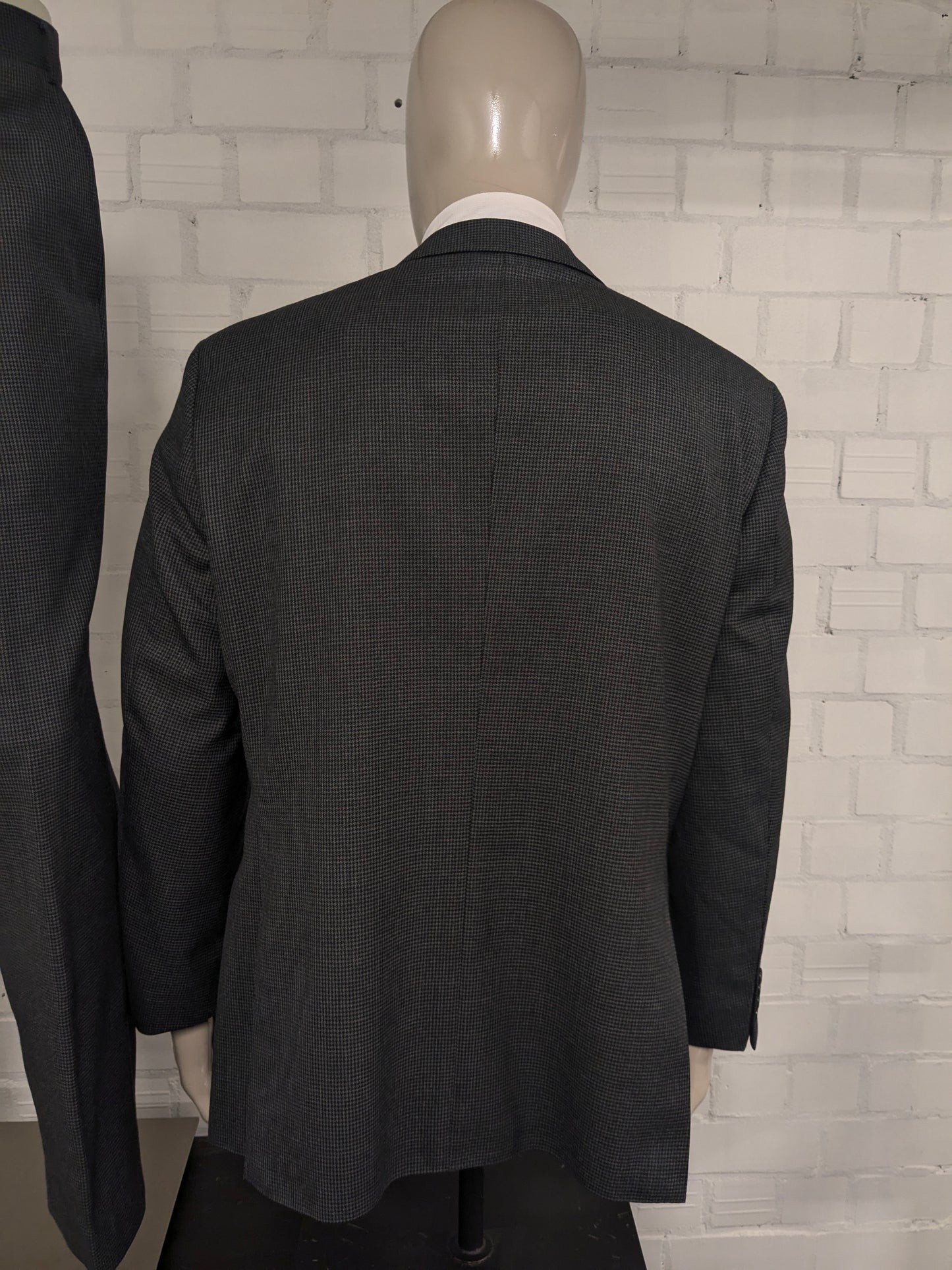 Abito Scabal in lana realizzato su misura. Motivo grigio nero. Taglia 56/XL.