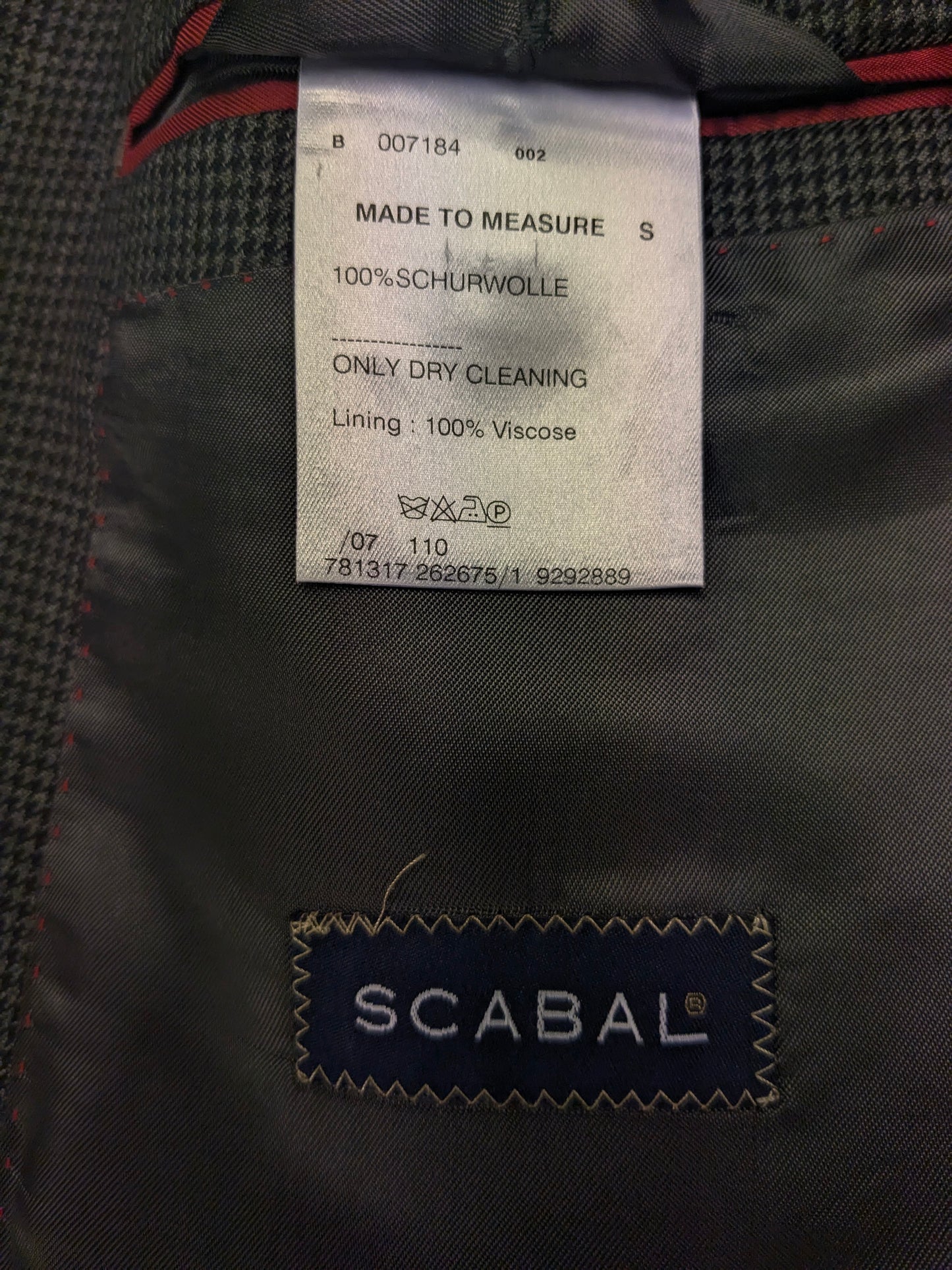 Abito Scabal in lana realizzato su misura. Motivo grigio nero. Taglia 56/XL.
