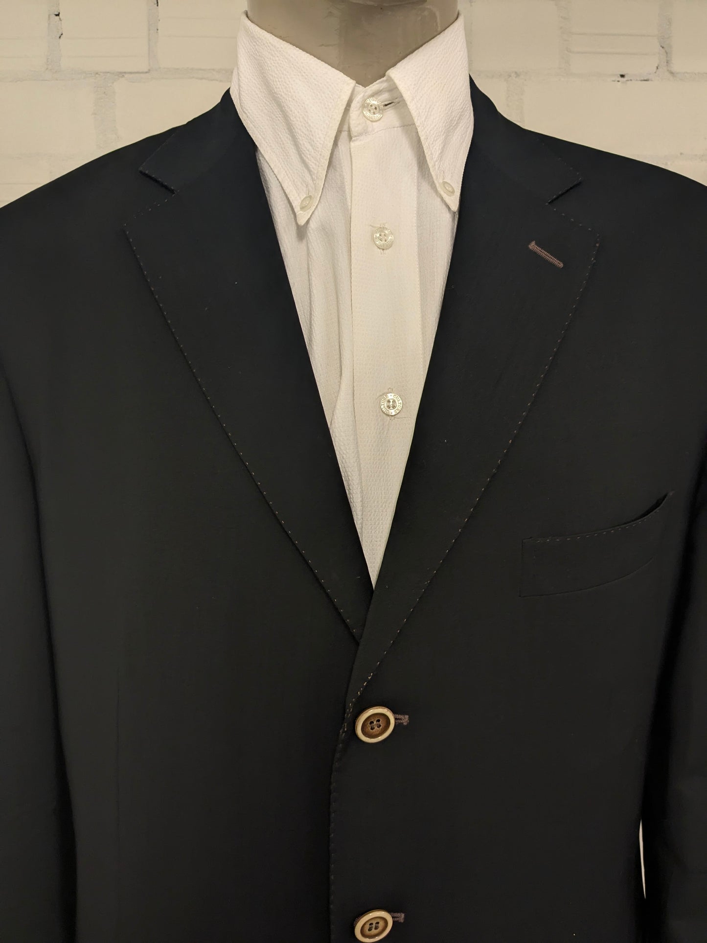 Giacca in lana Pal Zileri. Nero con cuciture marroni. Taglia 58/XL.