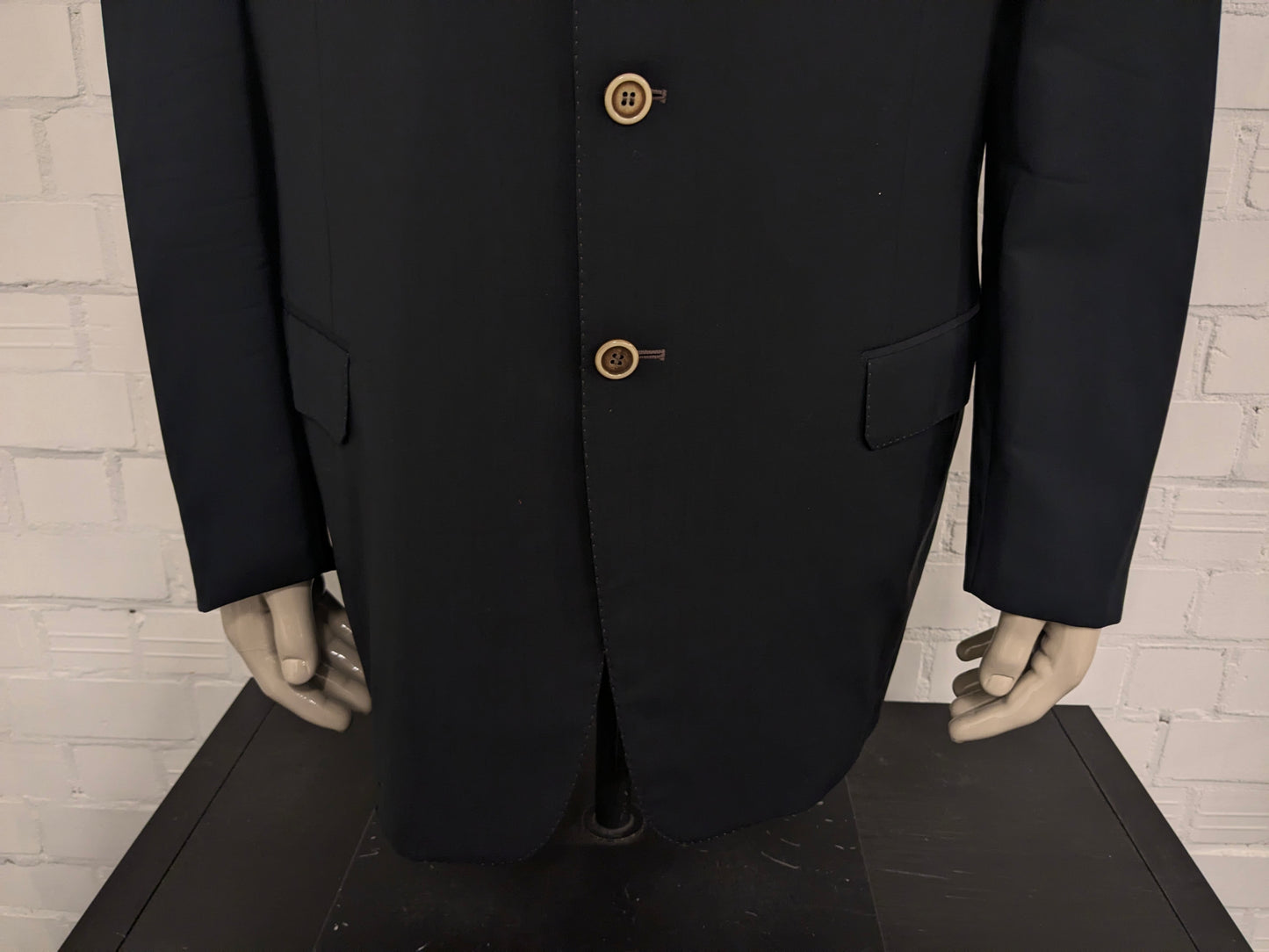 Giacca in lana Pal Zileri. Nero con cuciture marroni. Taglia 58/XL.