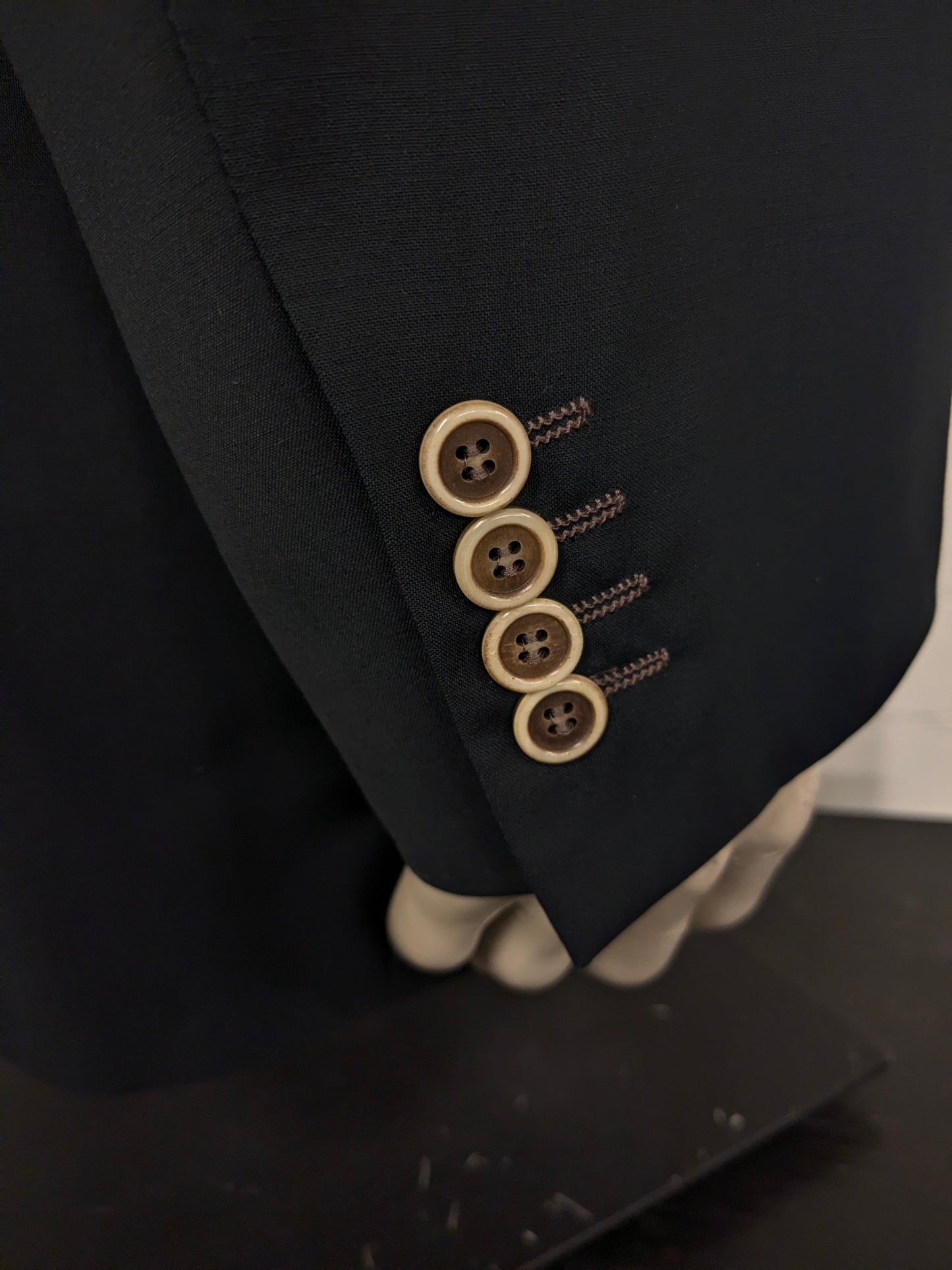 Giacca in lana Pal Zileri. Nero con cuciture marroni. Taglia 58/XL.